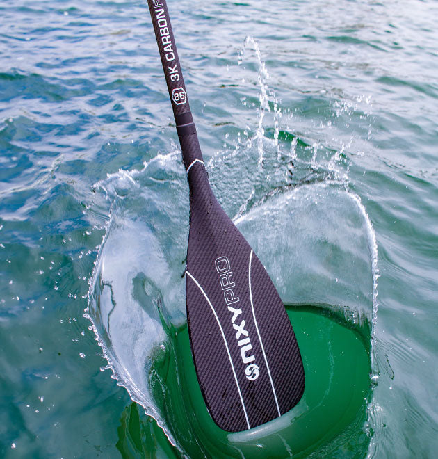 NIXY 100% Carbon Fiber Paddleboard Paddle splashing the water