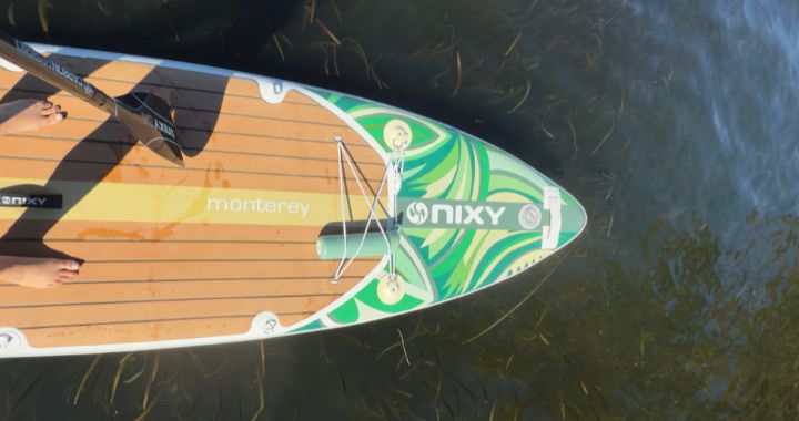 Wide, stable NIXY inflatable paddle board for heavier paddlers