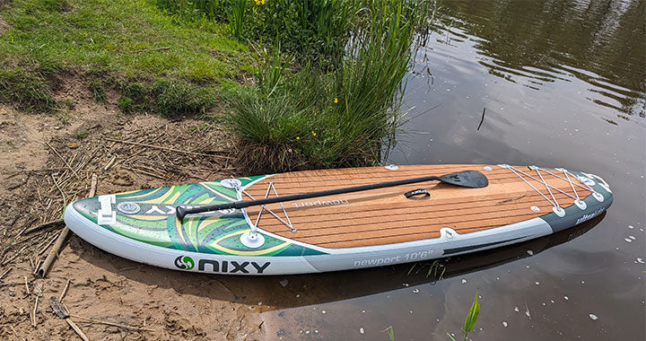 NIXY Monterey G5 inflatable paddleboard floating on the water
