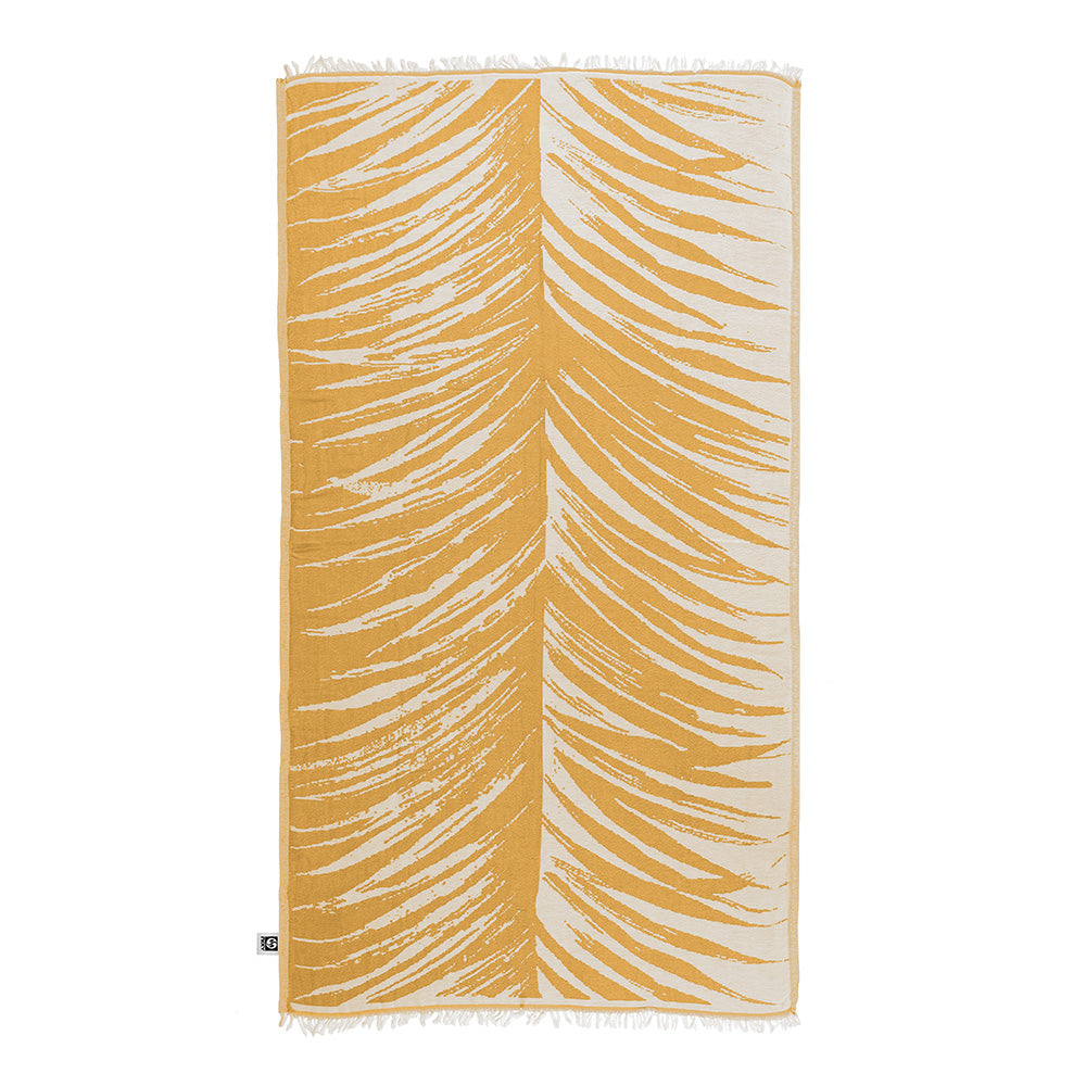 NIXY Palm Turkish Beach Towel in yellow, lightweight Turkish cotton with palm-inspired design