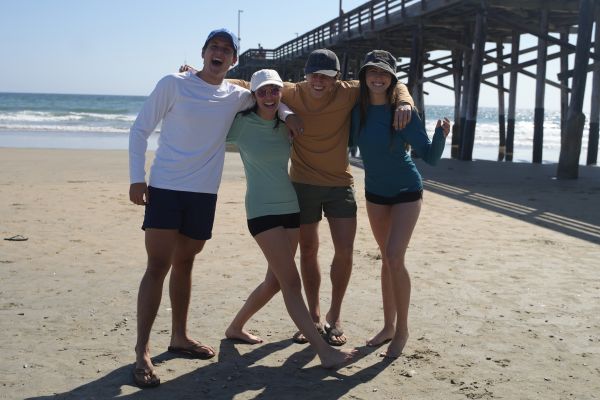 Paddlers wearing NIXY UPF 50+ rash guards