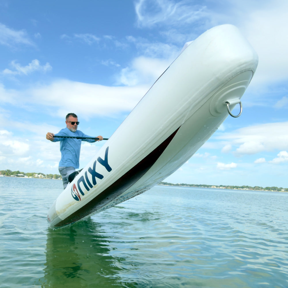 NIXY Malibu G5 inflatable touring paddle board on the water