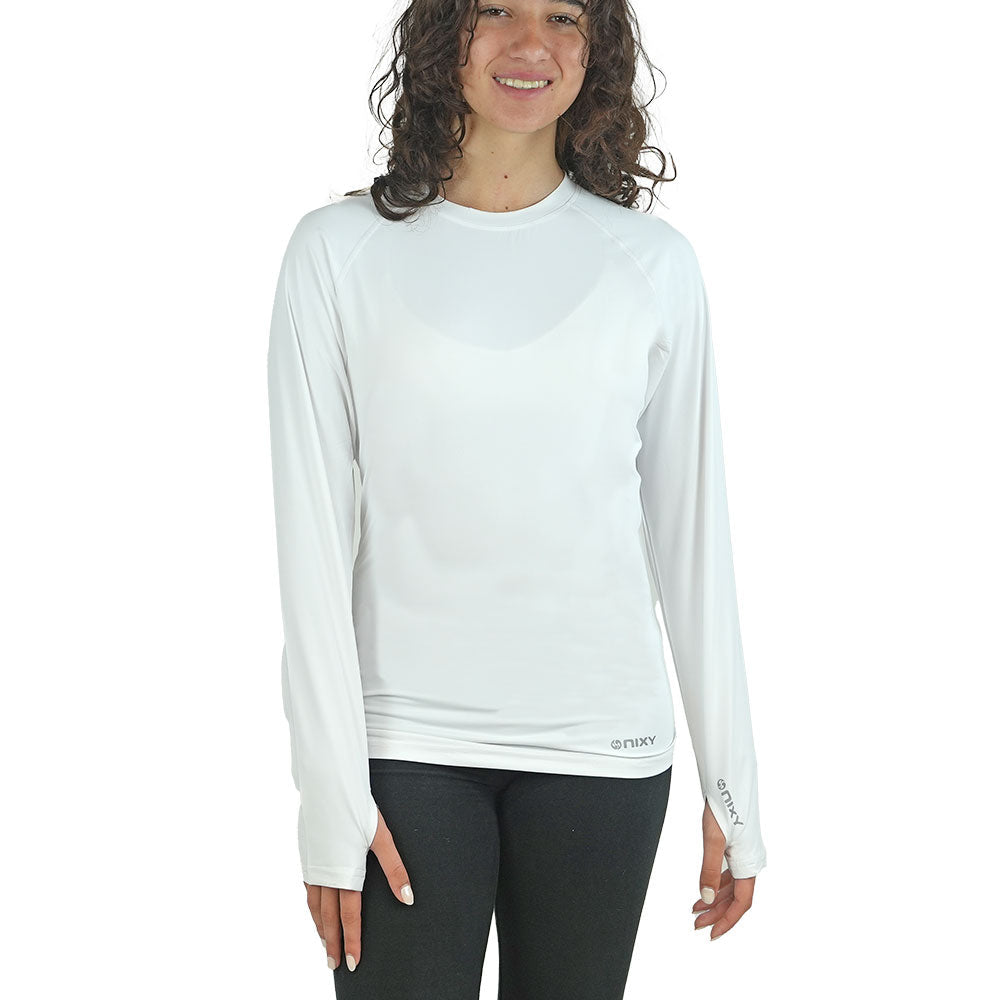 NIXY Women's Rash Guard UPF 50+ in white, worn by a paddler