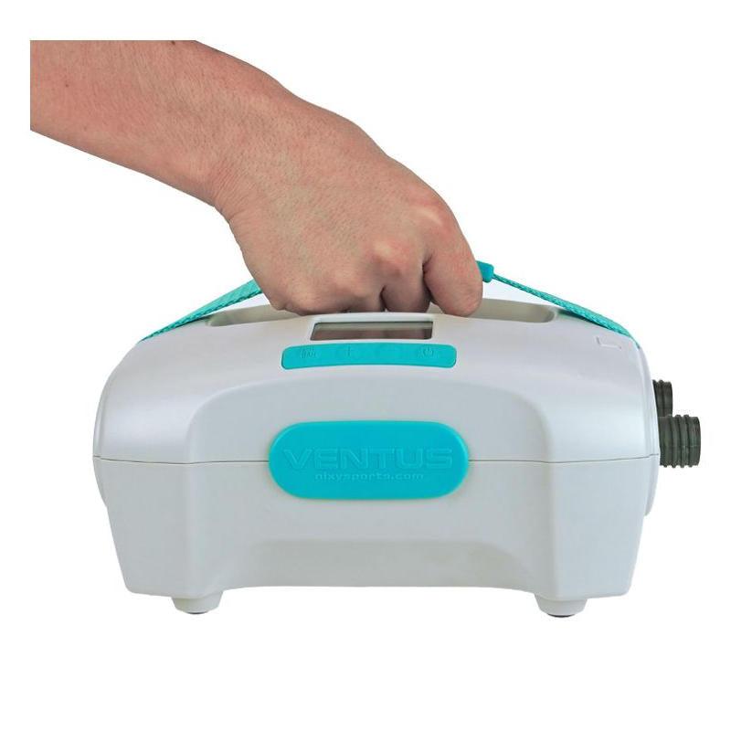 A hand carrying the NIXY Ventus electric SUP pump by its strap