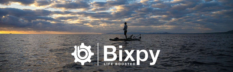 Scenic photo of a man on a paddleboard with the text "Bixpy Life Boosted"