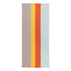 Striped Turkish cotton beach towel with red, yellow, and gray stripes on a white background