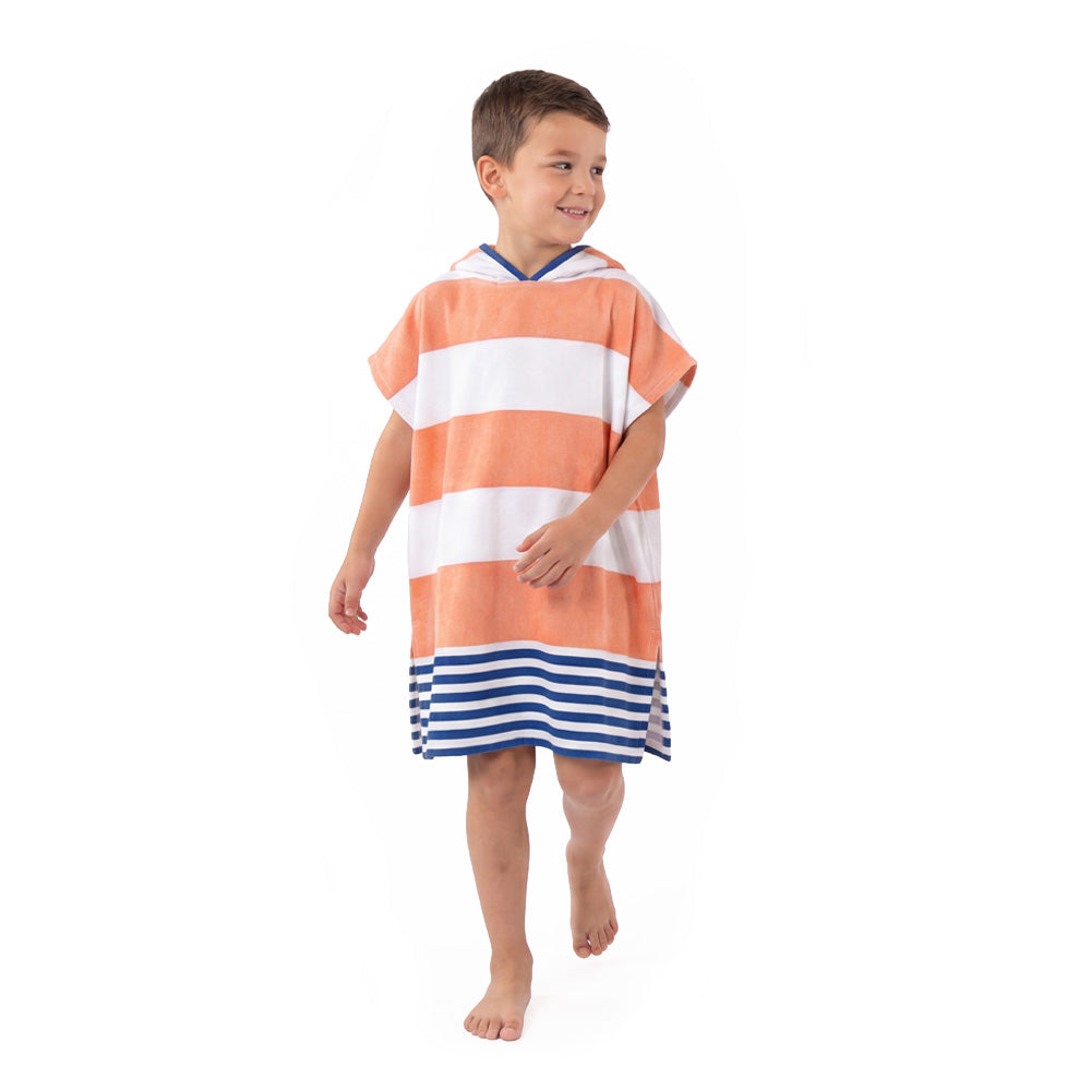 Child wearing a striped orange, white, and blue poncho on a white background
