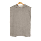 Olive sleeveless Turkish cotton changing poncho for kids on a wooden hanger against a white background