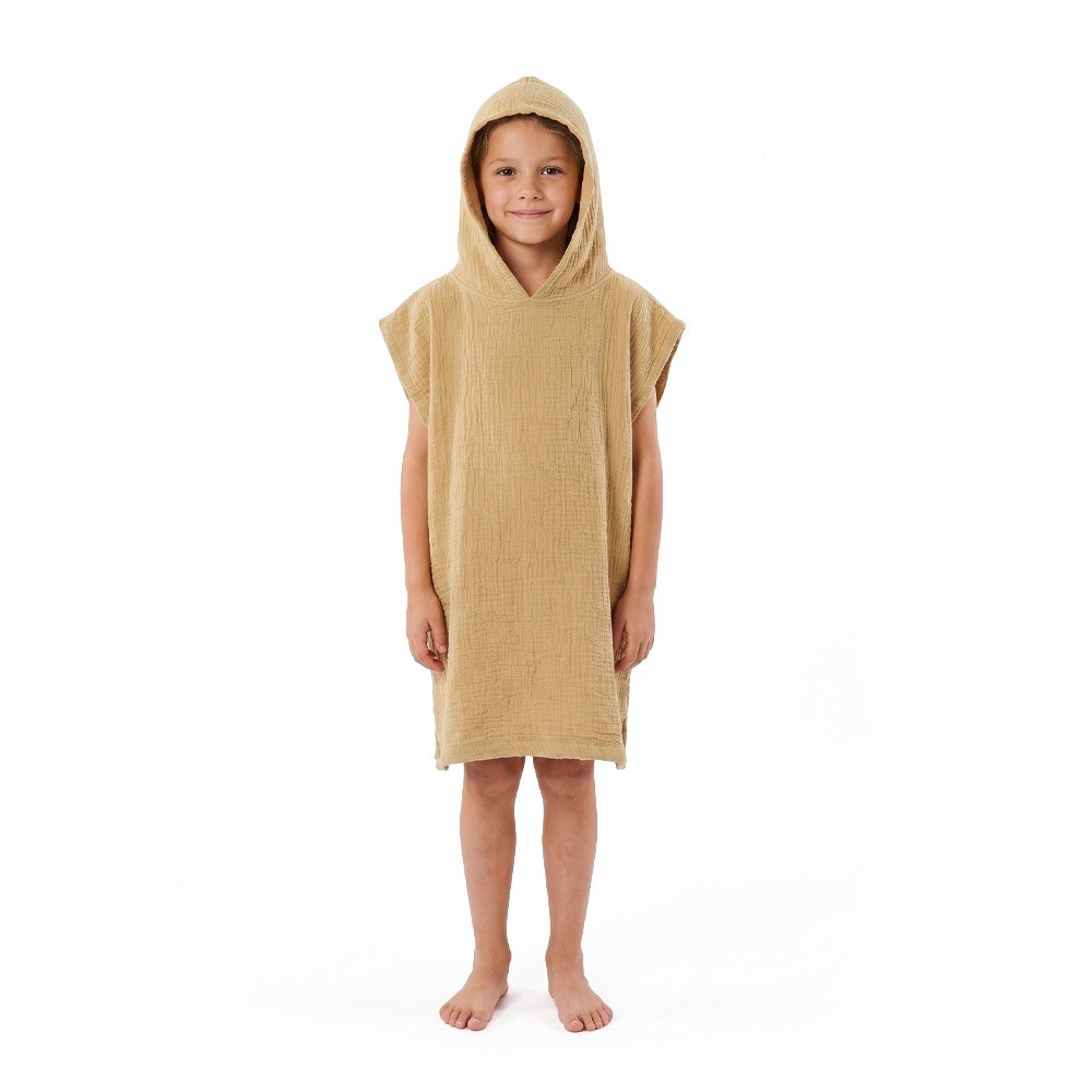 NIXY Kids Changing Poncho Towel Mustard worn by model with a white background
