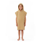 NIXY Kids Changing Poncho Towel Mustard worn by model with a white background