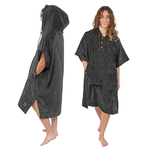 Women wearing NIXY Adult Towel changing poncho with the hood up showcasing the oversized design.