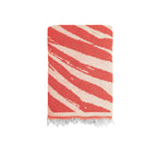 Close-up of the NIXY Palm Turkish Beach Towel in Bright Red, 100% Turkish cotton weave with palm-leaf print