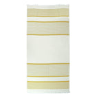 Yellow striped Shoreline Turkish cotton beach towel with white tassels on a white background