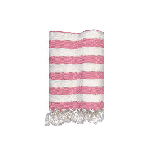 Pink and white striped Turkish cotton and bamboo beach towel with frayed edges on a white background