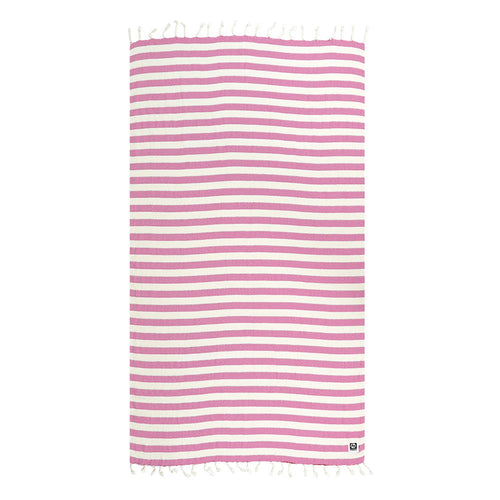 Striped NIXY Turkish cotton and bamboo beach towel with pink and white stripes on a white background