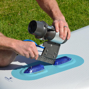 Man easily installing an electric sup motor on an inflatable paddleboard.