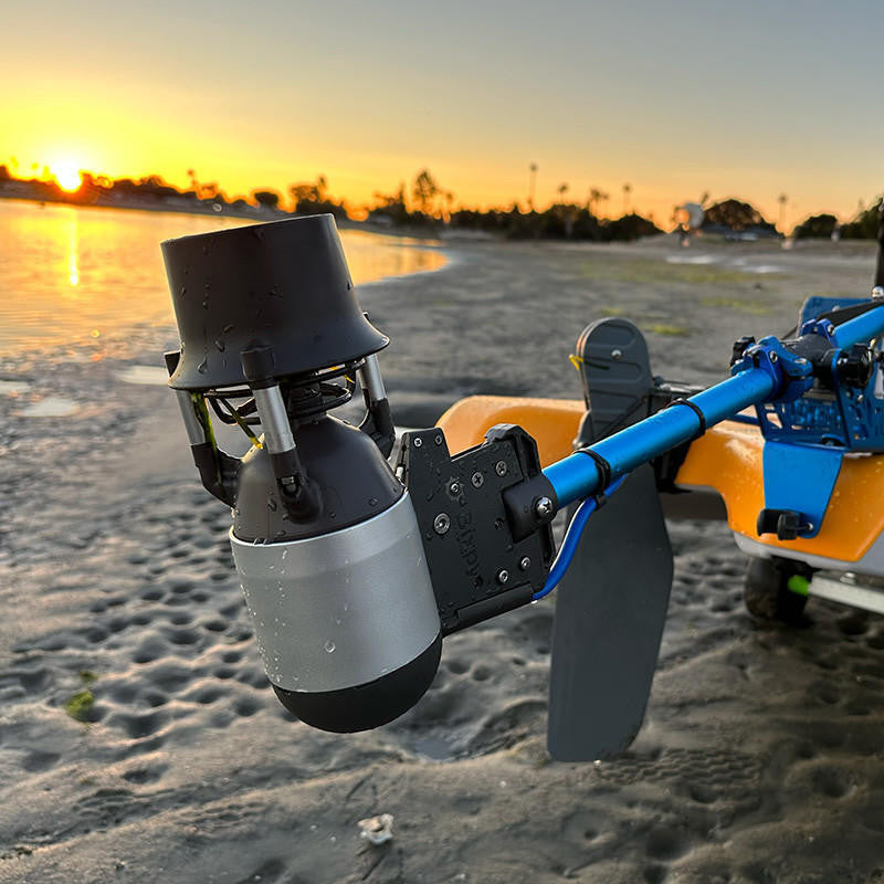 Kayak equipped with Bixpy K-1 Outboard Kit