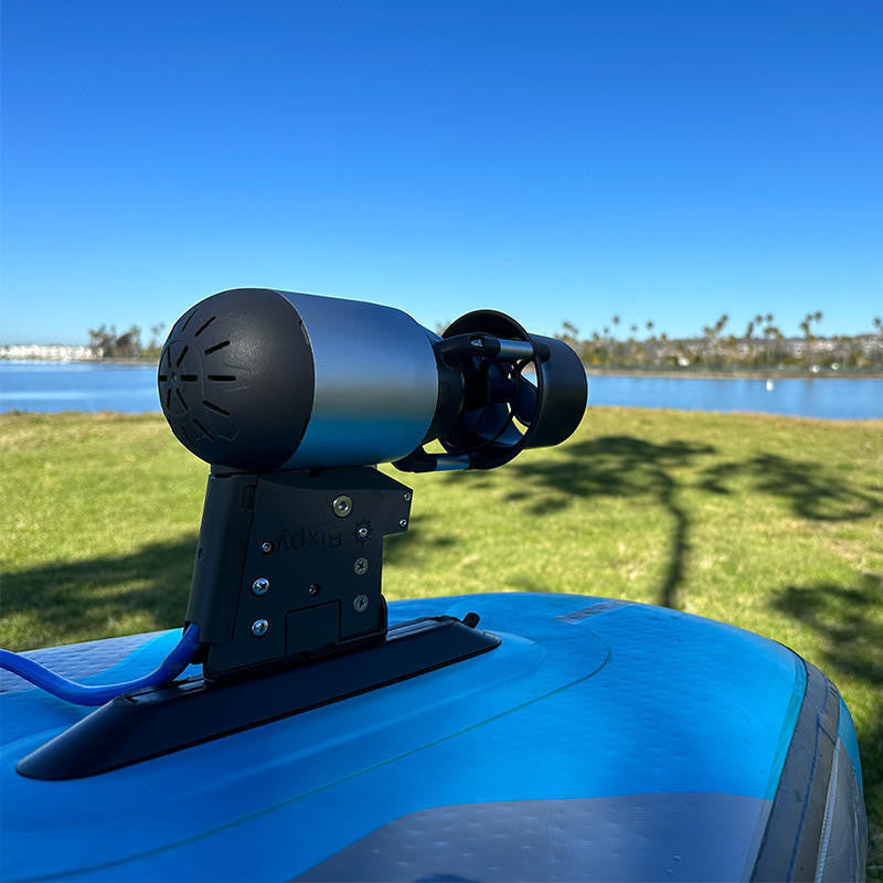 Side view of paddleboard motorized with Bixpy K-1 Outboard Kit