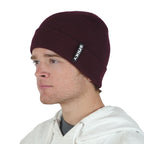 Man wearing merlot maroon NIXY Sports classic cuffed knit beanie with white hoodie – men's ribbed winter hat for casual and cold-weather outdoor wear
