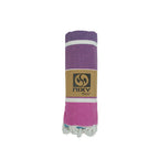 NIXY Rainbow Turkish Beach Towel rolled and styled on a white background, plush 430 gsm Turkish cotton