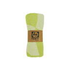 NIXY Squares Recycled Turkish Beach Towel in Lime rolled and styled on a white background