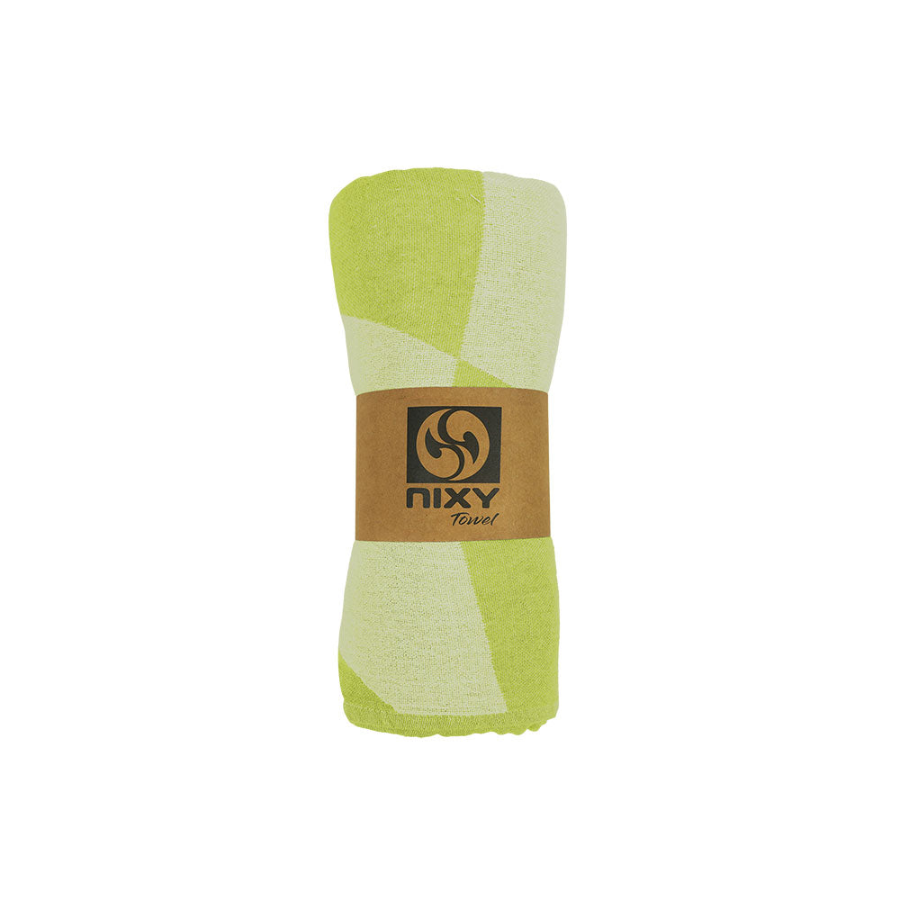 NIXY Squares Recycled Turkish Beach Towel in Lime rolled and styled on a white background