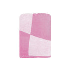 Close-up of the NIXY Squares Recycled Turkish Beach Towel in Pink, 100% recycled Turkish cotton weave