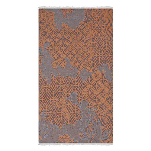 Patterned Turkish cotton beach towel with brown and gray design on a white background