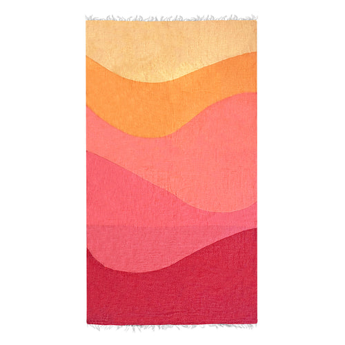 Colorful Turkish cotton beach towel with wavy pattern on a white background