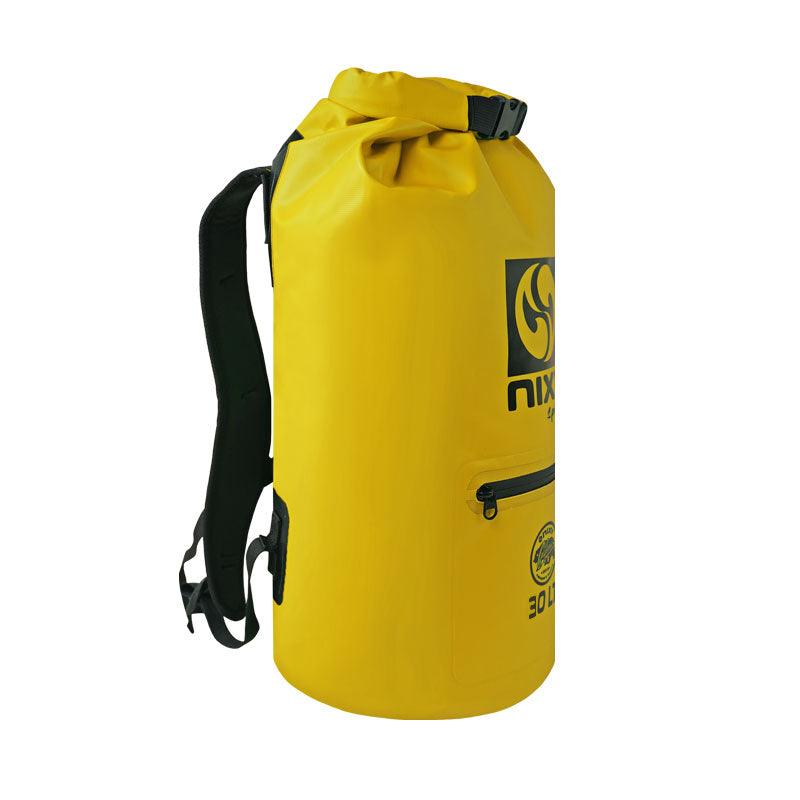 Yellow 30L waterproof dry bag in front of a white background