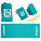 NIXY Landing Mat in Aqua complete set with carry bag, folded mat, yellow ground stakes and unfolded mat showing NIXY sports logo, lightweight waterproof ripstop nylon ground cover for paddleboarding, SUP, kayaking and beach adventures