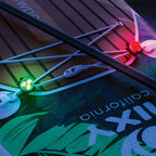 Close up image of NIXY Navigation Lights attached to a paddleboard