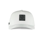 NIXY Stoked Trucker Water Hat in white front view featuring black embossed NIXY rubber logo patch and curved brim