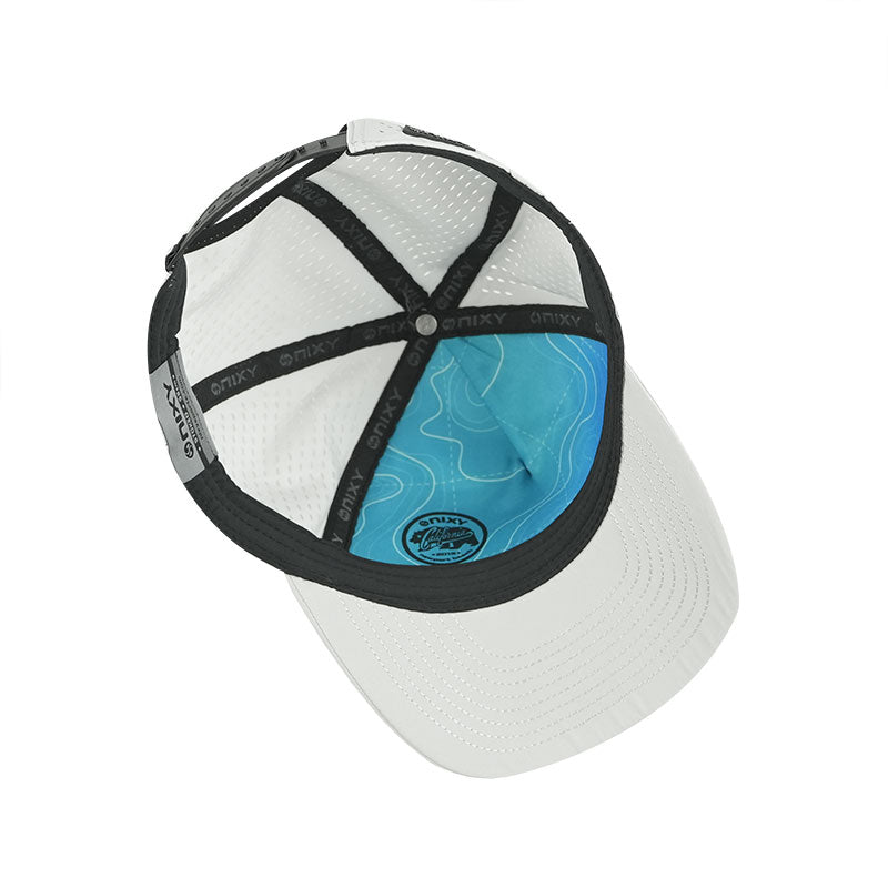 NIXY Stoked Trucker Water Hat in white interior view with NIXY branded sweatband and moisture-wicking lining